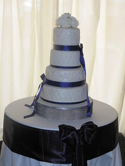 *4 tier lace and quilt with a touch off purple  - Cake by d and k creative cakes