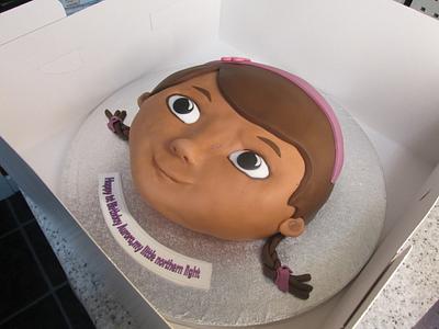 Doc McStuffin sculpted face cake - Cake by MarksCakes