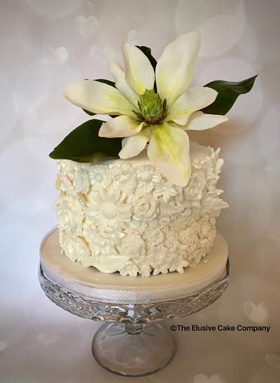 Magnolia and Bas relief  - Cake by The Elusive Cake Company
