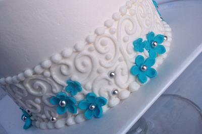 teal blossoms with scrolls - Cake by Corrie