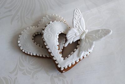 Heart cookies with butterfly detail - Cake by Zoe's Fancy Cakes