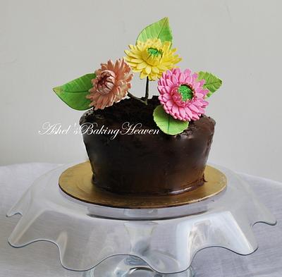 "Chocolate Flower Pot with gerbera daisies!!! - Cake by Ashel sandeep