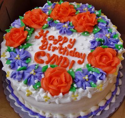 Coral and purple buttercream flowers on cake - Cake by Nancys Fancys Cakes & Catering (Nancy Goolsby)