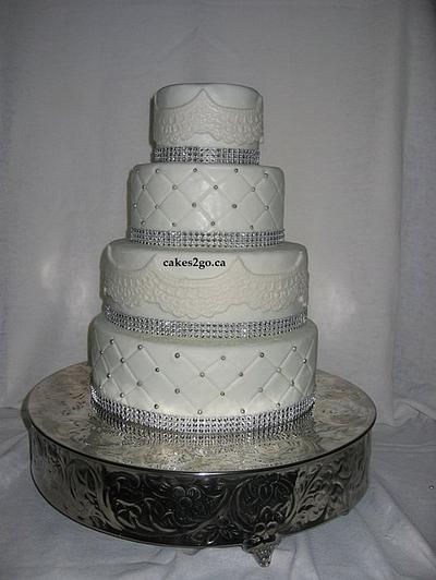 Simple White and lace Wedding Cake - Cake by cakes2gobymayanaji