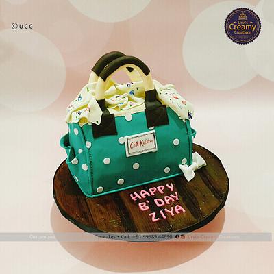 Mini hand bag birthday cake - Decorated Cake by Nivia - CakesDecor