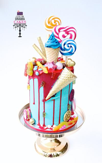 Candy loaded drip cake  - Cake by Color Drama Cakes