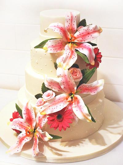 Stargazer lily wedding cake - Cake by Danielle Lainton