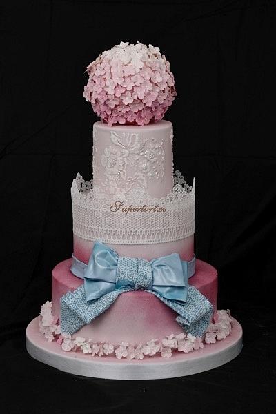 Wedding lace cake in pink with blue bow and hortensias - Cake by Olga Danilova