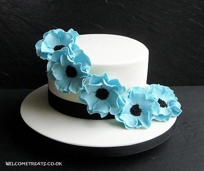 Ivory Cake with Blue Casual Roses - Cake by welcometreats