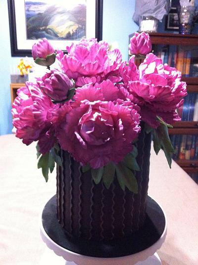 Modeling chocolate panels and gum paste peonies - Cake by Tracy Karp