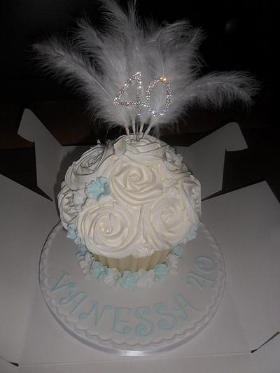 large giant white cupcake with feathers - Cake by elizabeth