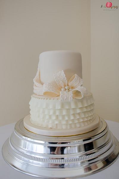 Lace Bow, Pearls and Frills cake  - Cake by Tiers Of Happiness