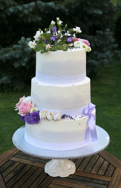 wedding cake with mickey & minnie topper :  - Cake by Lucya 