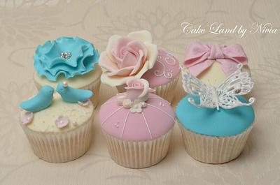 Teal and pink cupcakes - Cake by Nivia