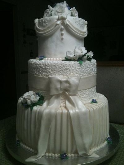 Wedding cake...first tiered fondant cake! - Cake by Joy Jarriel