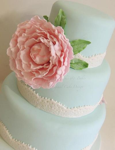 Pink peony on blue lace trimmed cake - Cake by Shereen