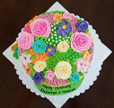 Whipping icing flowers  - Cake by Niyati