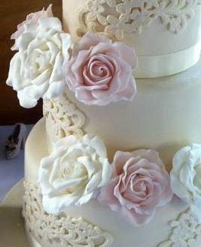 Three tier hand cut lace and sugarpaste rose cream wedding - Cake by Cupcake Group Limiited