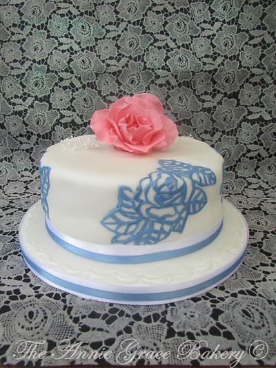 Handpainted rose motif and Pink sugar Rose - Cake by The Annie Grace Bakery