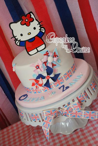 Hello Kitty Jubilee theme pinwheel cake (with acrylic topper) - Cake by CupcakesbyLouise