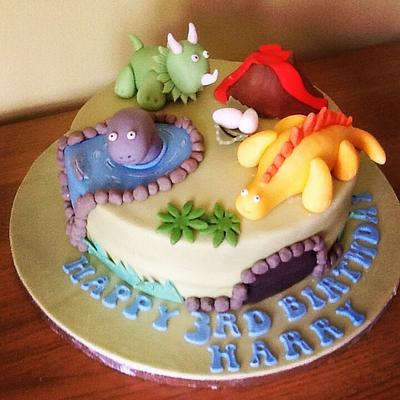 Dinosaurs rule the world!  - Cake by sayitwithcakeamy