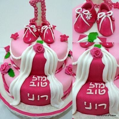 First Birthday cake with baby booties. - Cake by Veenas Art of Cakes 