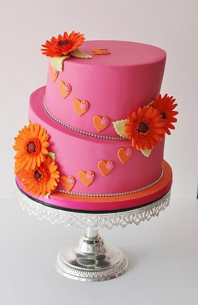 Hot pink topsy turvy wedding cake with hand made sugar gerbera's and hearts - Cake by Cakes o'Licious
