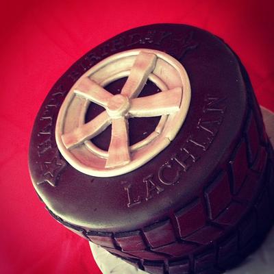 Stacked wheel cake for my son! - Cake by cjsweettreats