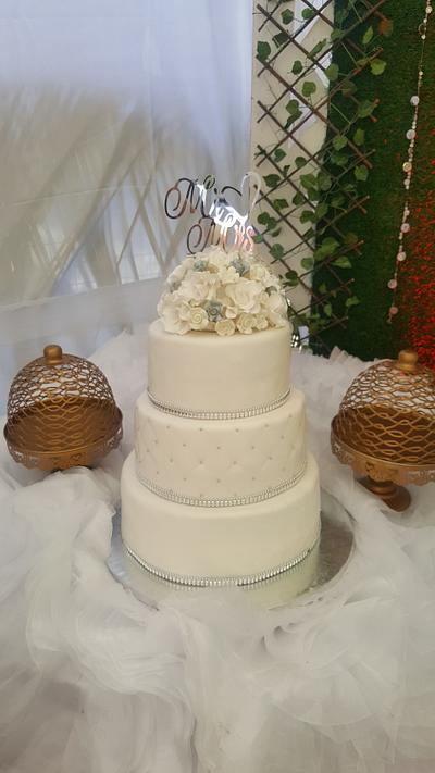 Elegantly White - Cake by Karamelo Cakes & Pastries