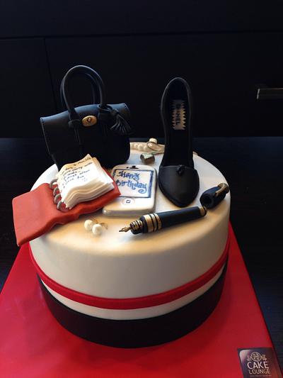 Birthday cake with Mulberry bag Chanel shoe pearl earrings and necklace and an agenda - Cake by Cake Lounge 