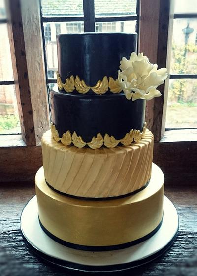 Brushed gold, Pleats, glossy and a peony. - Cake by Divine Bakes