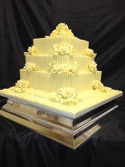 3 tier white belgium chocolate with fans and white roses white curls wedding cake - Cake by elizabeth