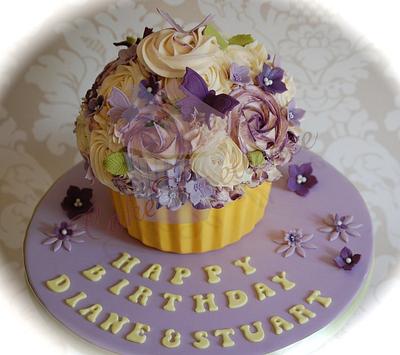 Giant Cupcake in shades of purple - Cake by CakeXcellence