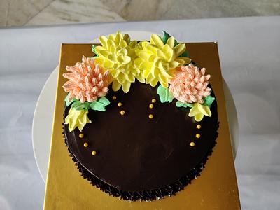 Truffle with whipped cream flowers - Cake by Varsha Bhargava