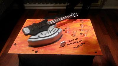 Gene Simmons guitar cake - Cake by Cakes with character by Angela