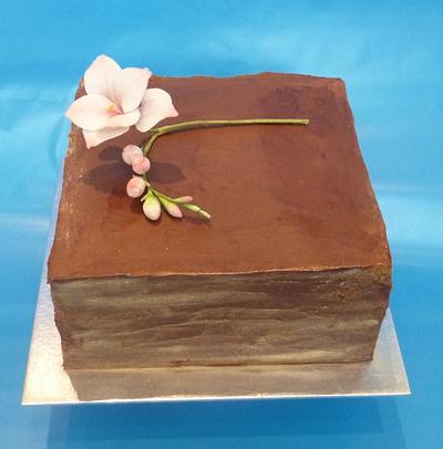 Simple ganache with freesia - Cake by Essentially Cakes