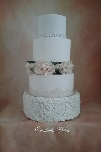 Ruffles and blooms - Cake by Essentially Cakes