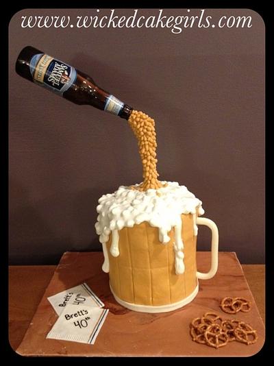 Pouring beer gravity defying cake.  - Cake by Wicked Cake Girls