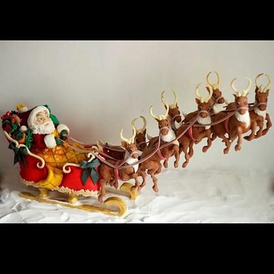 Santa with his flying reindeers - Cake by Sugar Spice