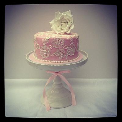 Pink cake with brush embroidery and a sugar rose. - Cake by funkyfabcakes