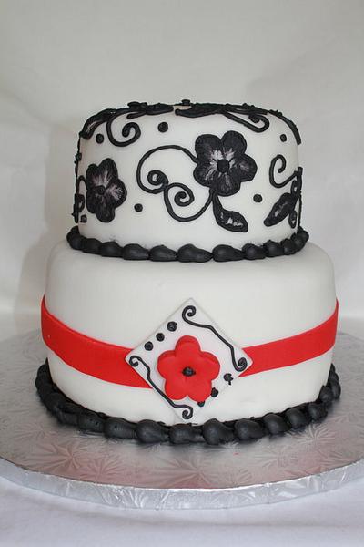 black embossed flowers with red ribbon - Cake by gingerbreads