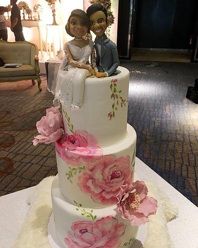 Hand painted peonies on a wedding cake - Cake by Savyscakes