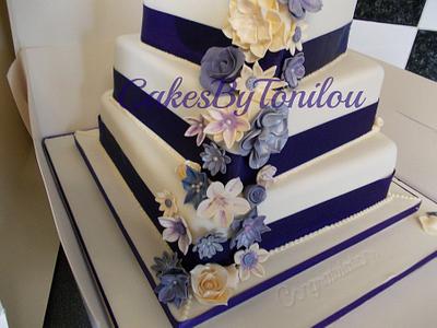 Cadburys purple wedding cake - Cake by CakesByTonilou