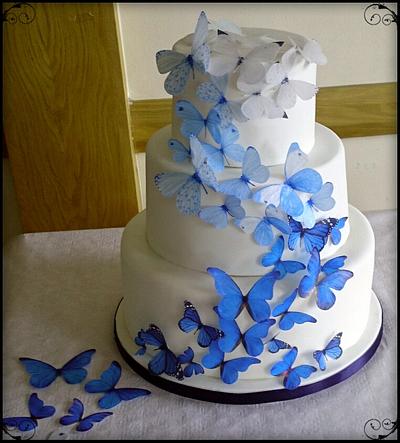 Cascading butterflies Wedding cake  - Cake by Divine Bakes