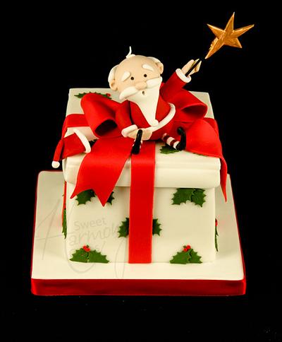 Santa on a parcel - Cake by Sweet Harmony Cakes