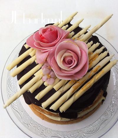 Chocolate bomb with marzipan roses - Cake by Judith-JEtaarten