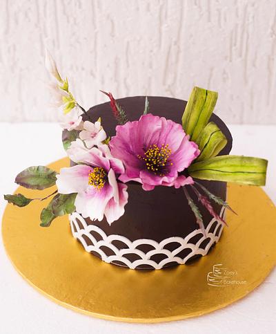 Cosmos and Stephanotis floral arrangement - Cake by Zoeys Bakehouse