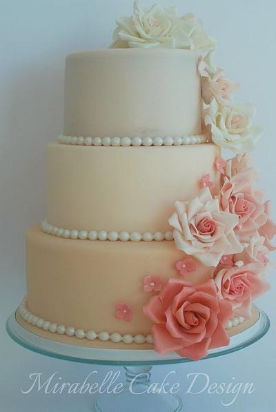 3 Tier Wedding cake in shades of pink with cascading roses - Cake by Mirabelle Cake Design
