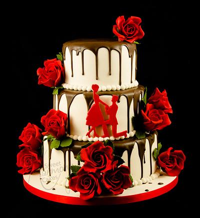 Chocolate drip engagement cake - Cake by Sweet Harmony Cakes