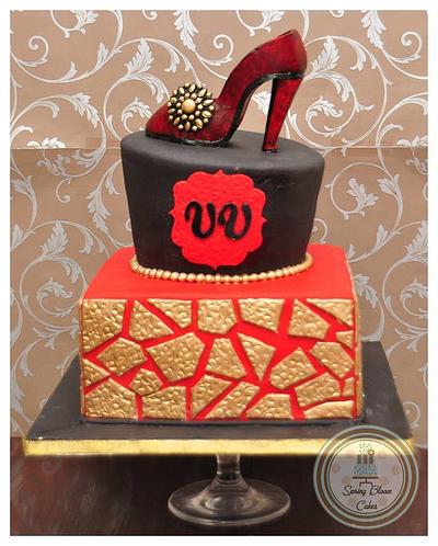 Red, Black and Gold Cake with a shoe - Cake by Spring Bloom Cakes